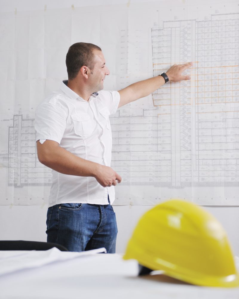 Construction Project business man Architect engineer manager at the construction site